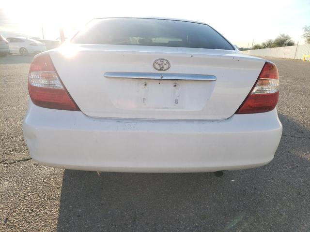 Photo 6 from auction – 2004 TOYOTA CAMRY LE with VIN JTDBE32K040277912