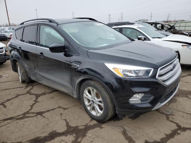 Photo 4 from auction – 2018 FORD ESCAPE SE with VIN 1FMCU0GD9JUC31673