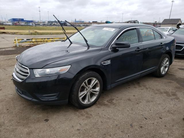 FORD TAURUS SEL 2014 with VIN 1FAHP2E87EG100352 - Photo from auction