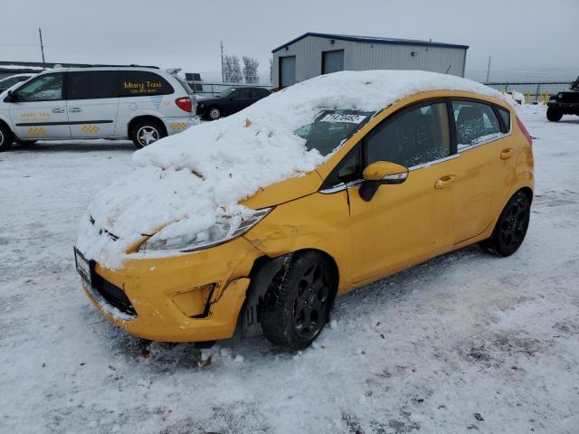 FORD FIESTA SES 2011 with VIN 3FADP4FJ2BM135765 - Photo from auction