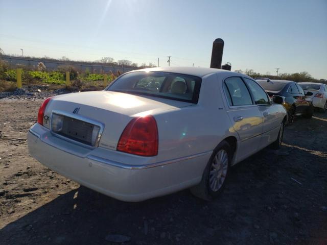 Photo 3 from auction – 2004 LINCOLN TOWN CAR U with VIN 1LNHM83W54Y664917