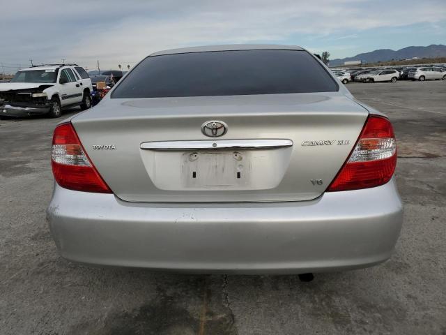 Photo 6 from auction – 2002 TOYOTA CAMRY LE with VIN 4T1BF30K32U034113