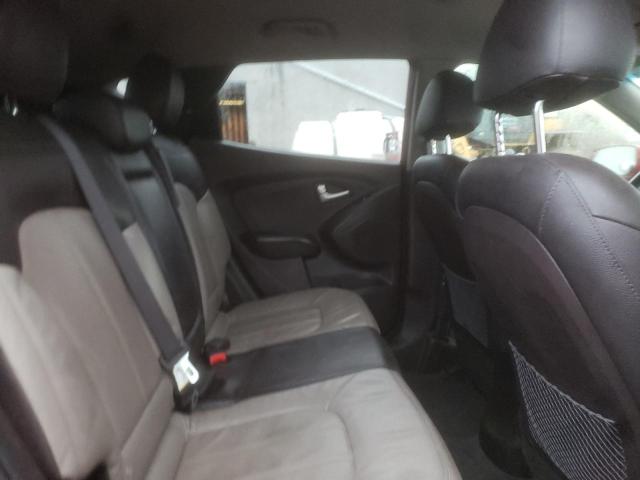 Photo 11 from auction – 2012 HYUNDAI TUCSON GLS with VIN KM8JUCAC8CU534486