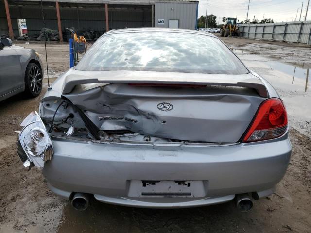Photo 6 from auction – 2006 HYUNDAI TIBURON GS with VIN KMHHM65D96U190836