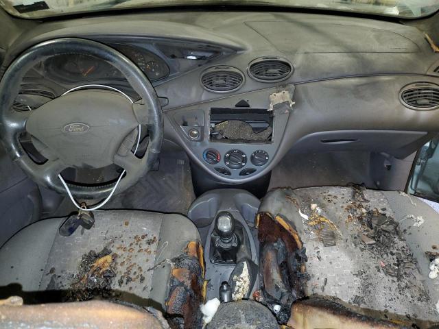 Photo 8 from auction – 2004 FORD FOCUS with VIN 3FAFP31354R111042