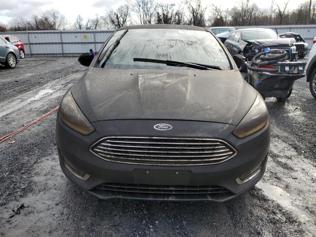 Photo 5 from auction – 2015 FORD FOCUS TITA with VIN 1FADP3N27FL247280