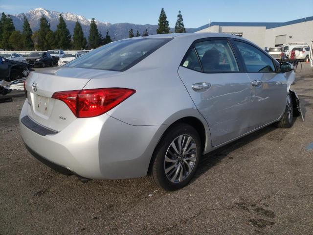 Photo 3 from auction – 2018 TOYOTA COROLLA L with VIN 5YFBURHE7JP749337