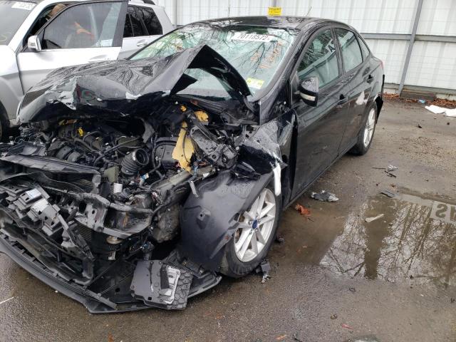 FORD FOCUS SE 2016 with VIN 1FADP3F24GL228296 - Photo from auction