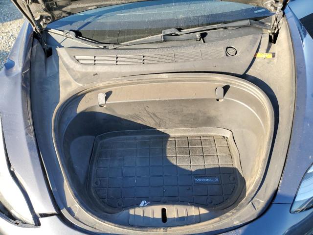 Photo 11 from auction – 2018 TESLA MODEL 3 with VIN 5YJ3E1EB2JF068947