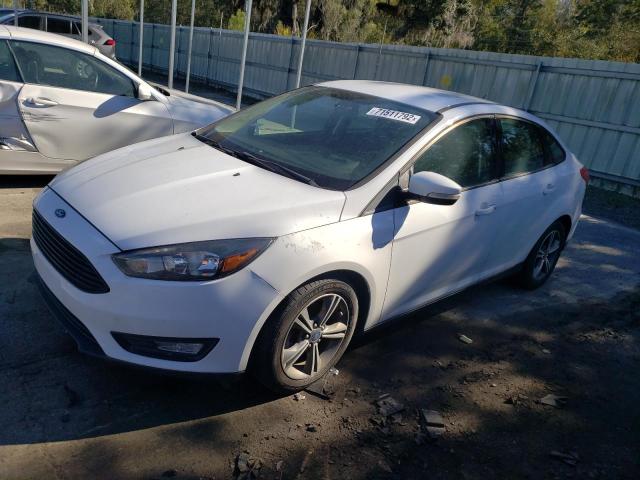 FORD FOCUS SE 2017 with VIN 1FADP3FE9HL274721 - Photo from auction