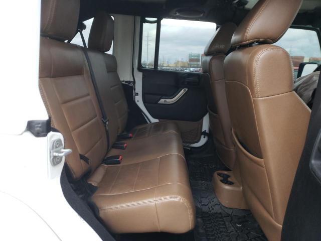 Photo 11 from auction – 2011 JEEP WRANGLER U with VIN 1J4BA3H15BL623999