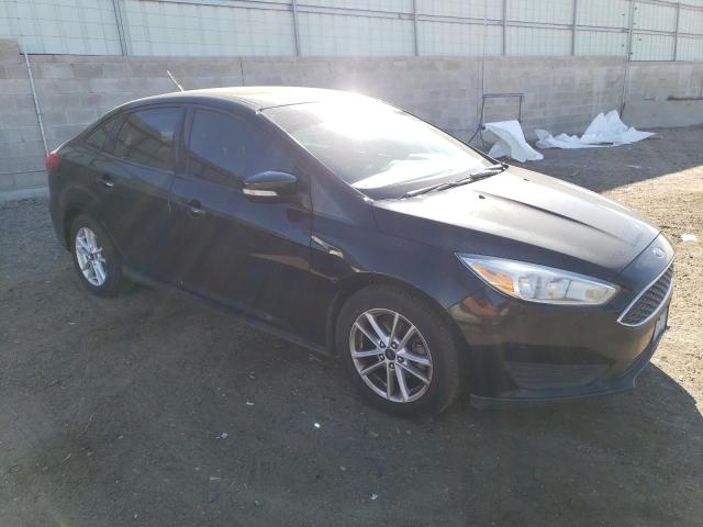 Photo 4 from auction – 2015 FORD FOCUS SE with VIN 1FADP3F2XFL234392