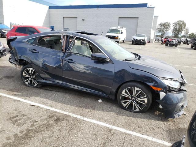Photo 4 from auction – 2018 HONDA CIVIC EX with VIN JHMFC1F34JX015861