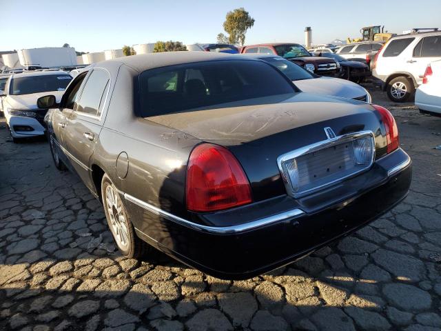 Photo 2 from auction – 2004 LINCOLN TOWN CAR E with VIN 1LNHM81W84Y629274
