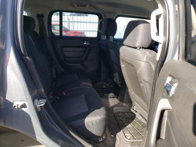 Photo 11 from auction – 2009 HUMMER H3 with VIN 5GTEN13E098135104