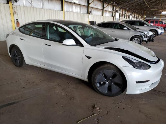 Photo 4 from auction – 2022 TESLA MODEL 3 with VIN 5YJ3E1EA4NF115814