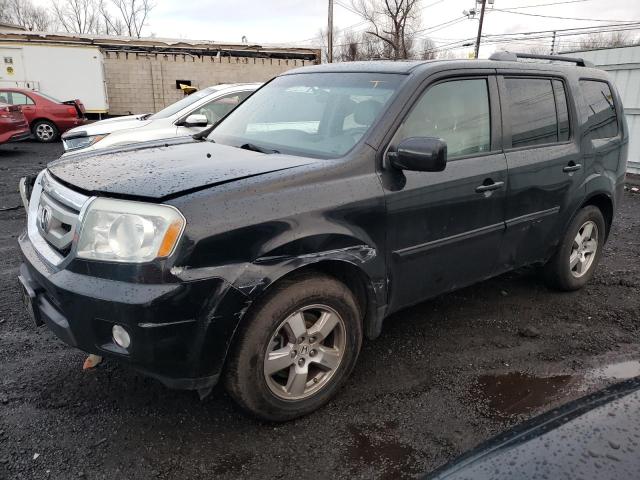 HONDA PILOT EXLN 2011 with VIN 5FNYF4H74BB103663 - Photo from auction