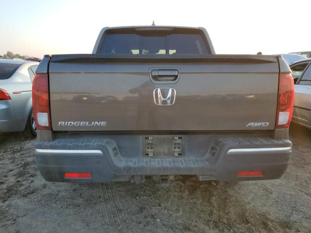 Photo 6 from auction – 2020 HONDA RIDGELINE with VIN 5FPYK3F75LB009101