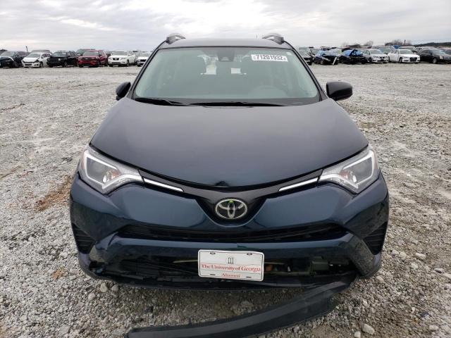 Photo 5 from auction – 2018 TOYOTA RAV4 LE with VIN 2T3ZFREV5JW499454