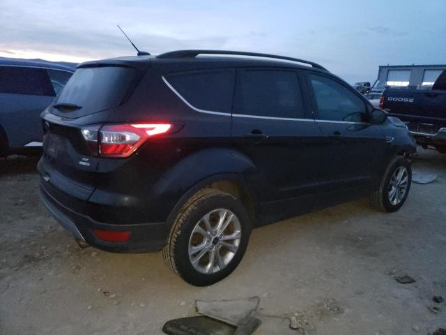 Photo 3 from auction – 2017 FORD ESCAPE SE with VIN 1FMCU9GD4HUE10170
