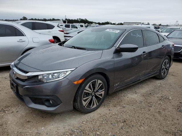 HONDA CIVIC EX 2018 with VIN JHMFC1F80JX003878 - Photo from auction