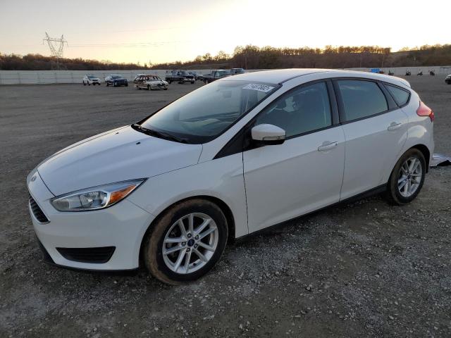 FORD FOCUS SE 2017 with VIN 1FADP3K27HL216585 - Photo from auction