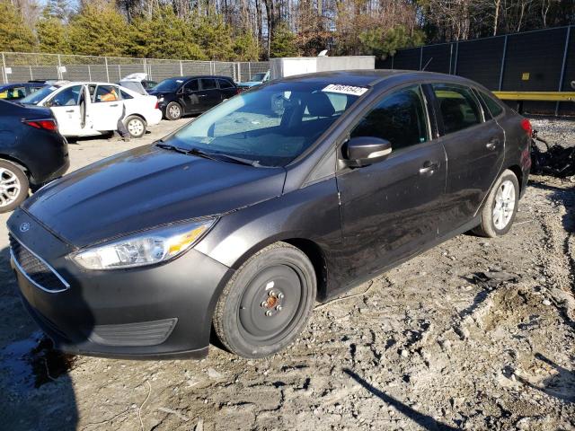 FORD FOCUS SE 2015 with VIN 1FADP3F20FL253100 - Photo from auction