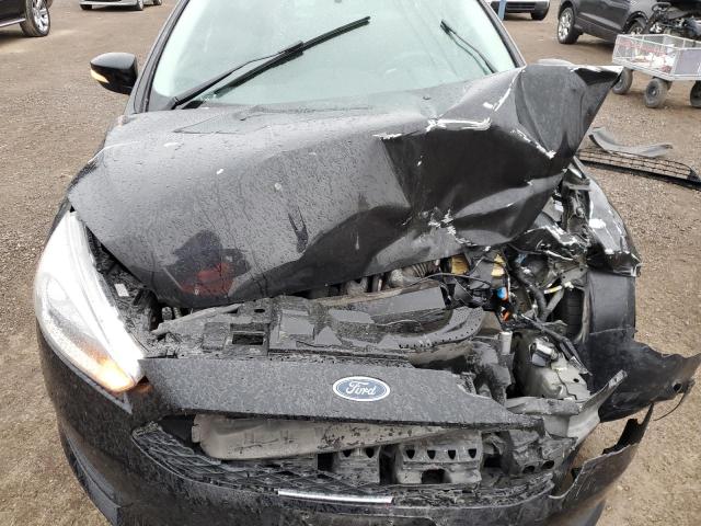 Photo 11 from auction – 2015 FORD FOCUS SE with VIN 1FADP3K26FL283479