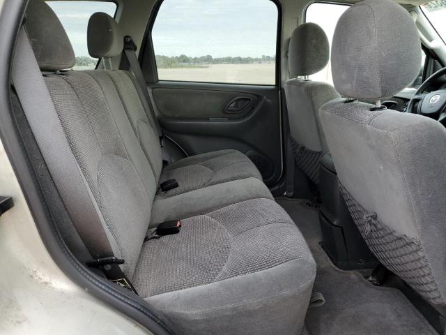 Photo 11 from auction – 2004 MAZDA TRIBUTE LX with VIN 4F2YZ04164KM06791