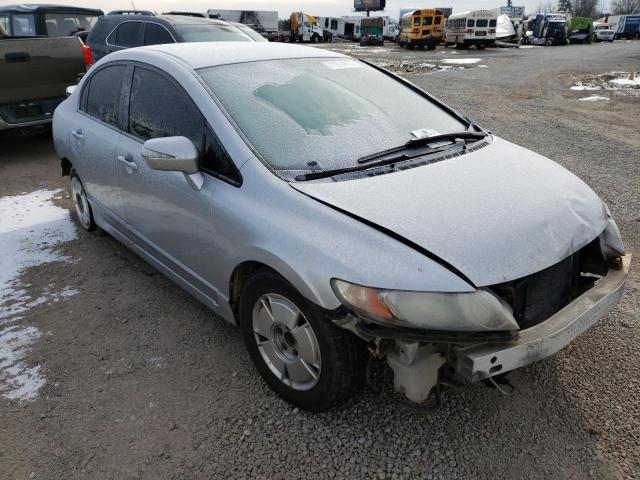 Photo 4 from auction – 2006 HONDA CIVIC HYBR with VIN JHMFA36286S014113