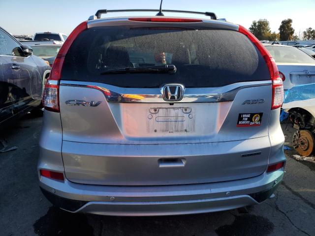 Photo 6 from auction – 2016 HONDA CR-V TOURI with VIN 5J6RM4H95GL061305