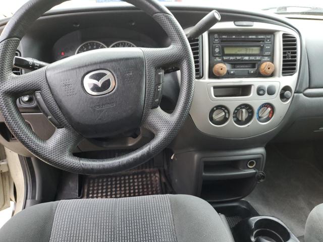 Photo 8 from auction – 2004 MAZDA TRIBUTE LX with VIN 4F2YZ04164KM06791