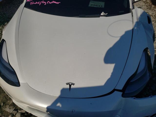 Photo 11 from auction – 2022 TESLA MODEL 3 with VIN 5YJ3E1EA0NF119925