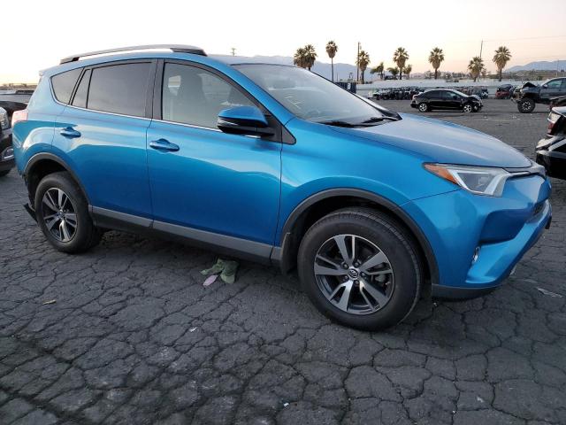 Photo 4 from auction – 2017 TOYOTA RAV4 XLE with VIN JTMWFREV3HD098401