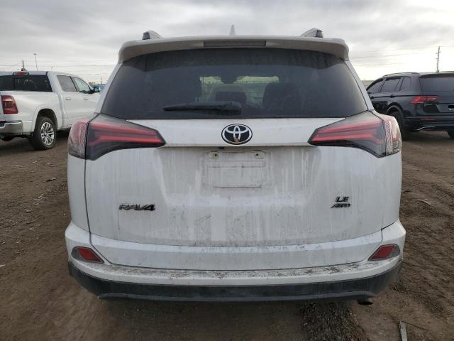 Photo 6 from auction – 2018 TOYOTA RAV4 LE with VIN 2T3BFREV1JW757115