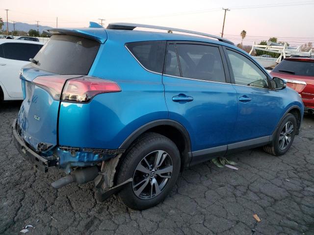 Photo 3 from auction – 2017 TOYOTA RAV4 XLE with VIN JTMWFREV3HD098401