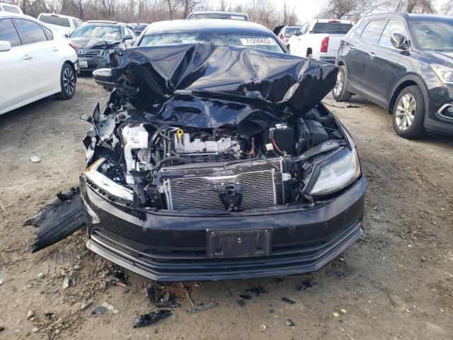 Photo 5 from auction – 2017 VOLKSWAGEN JETTA S with VIN 3VW2B7AJ2HM290704