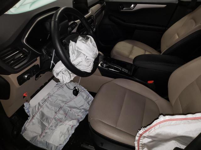 Photo 7 from auction – 2021 FORD ESCAPE SEL with VIN 1FMCU9H96MUA19543