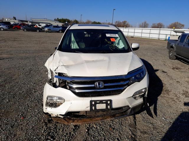Photo 5 from auction – 2017 HONDA PILOT ELIT with VIN 5FNYF6H0XHB060339
