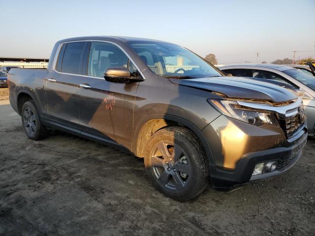 Photo 4 from auction – 2020 HONDA RIDGELINE with VIN 5FPYK3F75LB009101