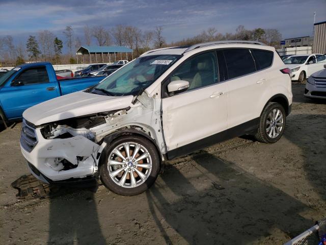 FORD ESCAPE TIT 2017 with VIN 1FMCU0J90HUE64310 - Photo from auction