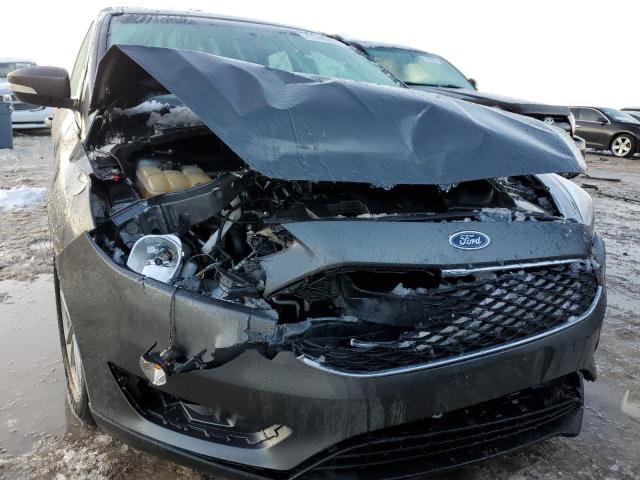 Photo 5 from auction – 2018 FORD FOCUS SE with VIN 1FADP3K21JL332807