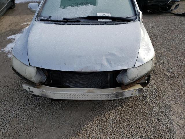Photo 11 from auction – 2006 HONDA CIVIC HYBR with VIN JHMFA36286S014113