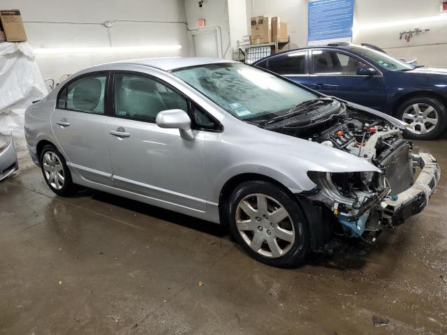 Photo 4 from auction – 2010 HONDA CIVIC LX with VIN 2HGFA1F52AH583377