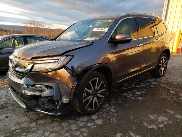 HONDA PILOT TOUR 2019 with VIN 5FNYF6H99KB094536 - Photo from auction