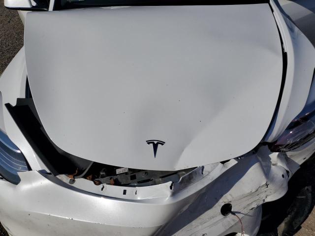 Photo 12 from auction – 2022 TESLA MODEL Y with VIN 7SAYGDEE5NF446263