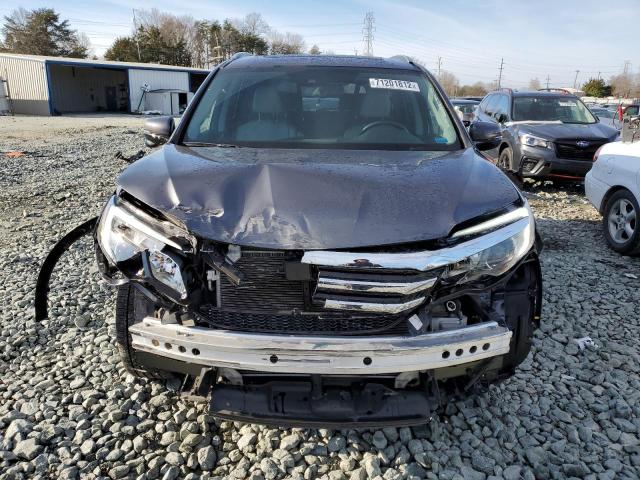 Photo 5 from auction – 2018 HONDA PILOT TOUR with VIN 5FNYF6H97JB026752
