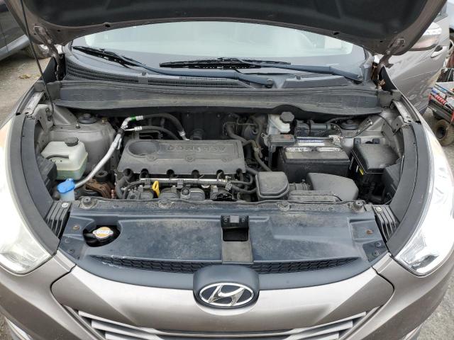 Photo 12 from auction – 2012 HYUNDAI TUCSON GLS with VIN KM8JUCAC7CU478900