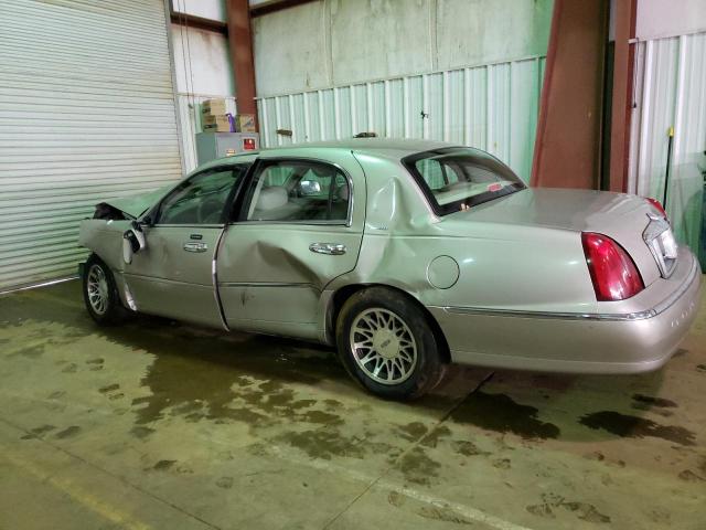 Photo 2 from auction – 2002 LINCOLN TOWN CAR E with VIN 1LNHM81W62Y614219