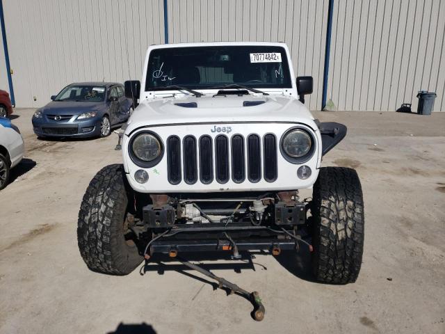 Photo 5 from auction – 2014 JEEP WRANGLER U with VIN 1C4BJWFG1EL231668